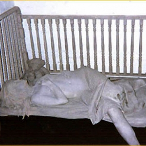 Joseph Canger Sculptures, crib, teddy bear
